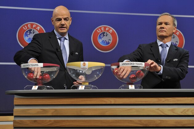 NYON, SWITZERLAND - AUGUST 08: UEFA General Secretary Gianni Infantino and UEFA Competition Director Giorgio Marchetti proceed to the 2014/15 UEFA Europa League Play-off round draw at the UEFA headquarters, The House of European Football, on August 8, 2014 in Nyon, Switzerland. (Photo by Harold Cunningham/Getty Images) NYON, SWITZERLAND - AUGUST 08: UEFA General Secretary Gianni Infantino and UEFA Competition Director Giorgio Marchetti proceed to the 2014/15 UEFA Europa League Play-off round draw at the UEFA headquarters, The House of European Football, on August 8, 2014 in Nyon, Switzerland. (Photo by Harold Cunningham/Getty Images)