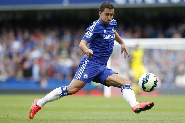 Chelsea's Eden Hazard plays against Leicester City during their English Premier League soccer match at Stamford Bridge, London, Saturday, Aug. 23, 2014. (AP Photo/Sang Tan)