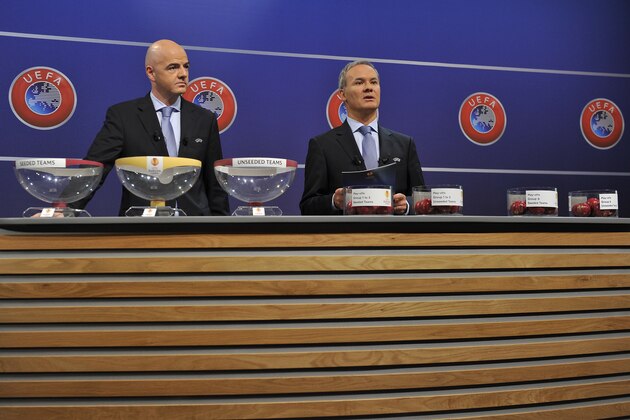 NYON, SWITZERLAND - AUGUST 08:  UEFA General Secretary Gianni Infantino and UEFA Competition Director Giorgio Marchetti proceed to the 2014/15 UEFA Europa League Play-off round draw at the UEFA headquarters, The House of European Football, on August 8, 2014 in Nyon, Switzerland.  (Photo by Harold Cunningham/Getty Images)