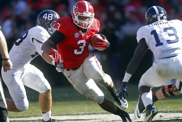 FILE - In this Nov. 17, 2012, file photo, Georgia running back Todd Gurley (3) runs against Georgia Southern linebackers Patrick Flowe (48) and Darius Eubanks (13) in the first half of an NCAA college football game in Athens, Ga.  In a game as tight as No. 5 Georgia vs. No. 8 Clemson, any edge might be the difference. And the Bulldogs appear to have a big one in the backfield with sophomore runners Keith Marshall and Gurley. (AP Photo/John Bazemore)