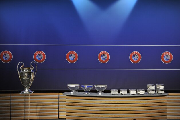 NYON, SWITZERLAND - JULY 18:  The UEFA Champions League trophy and draw are prepared for the UEFA 2014/15 Champions League third qualifying rounds draw at the UEFA headquarters, The House of European Football, on July 18, 2014 in Nyon, Switzerland.  (Photo by Harold Cunningham/Getty Images for UEFA)