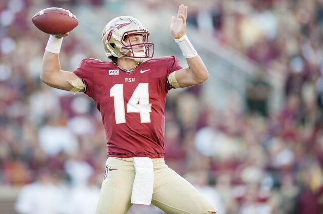 TALLAHASSEE, FL - OCTOBER 26: Jacob Coker #14 of the Florida State Seminoles winds up for a throw during the second half against the North Carolina State Wolfpack at Doak Campbell Stadiumon October 26, 2013 in Tallahassee, Florida. The Seminoles beat the Wolfpack 49-17. (Photo by Jeff Gammons/Getty Images)