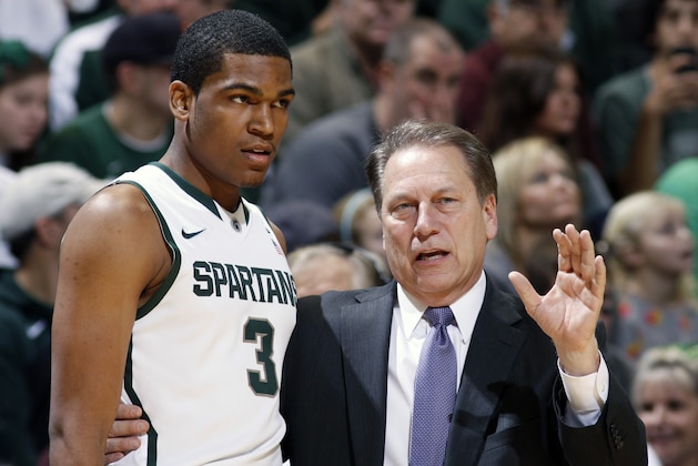 Michigan State coach Tom Izzo, right, talks to Alvin Ellis III (3) during the second half of an NCAA college basketball game against Mount St. Mary's, Friday, Nov. 29, 2013, in East Lansing, Mich. Michigan State won 98-65. (AP Photo/Al Goldis)