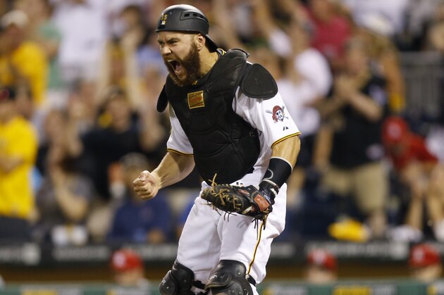 Pittsburgh Pirates catcher Russell Martin reacts after the Pirates completed an inning-ending bases-loaded double play on a grounder by St. Louis Cardinals' Oscar Taveras in the sixth inning of a baseball game Monday, Aug. 25, 2014, in Pittsburgh. (AP Photo/Keith Srakocic)