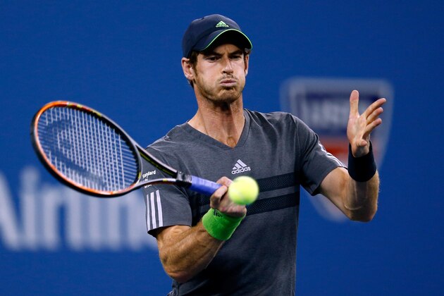 NEW YORK, NY - AUGUST 28:  Andy Murray of Great Britain returns a shot against Matthias Bachinger of Germany on Day Four of the 2014 US Open at the USTA Billie Jean King National Tennis Center on August 28, 2014 in the Flushing neighborhood of the Queens borough of New York City.  (Photo by Julian Finney/Getty Images)