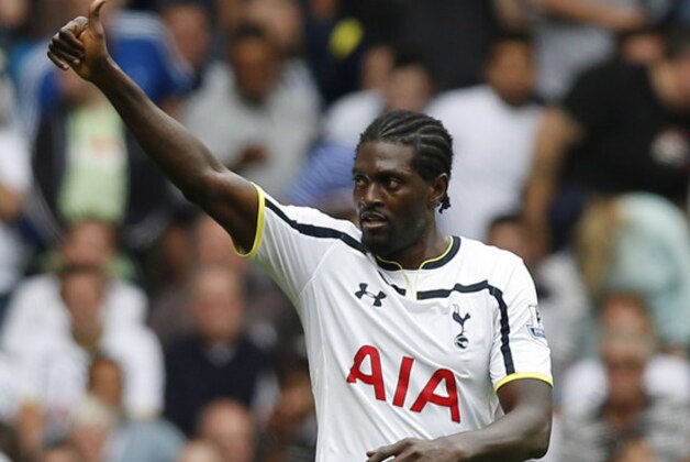 Tottenham Hotspur's Emmanuel Adebayor celebrates his goal against Queens Park Rangers during their English Premier League soccer match at White Hart Lane, London, Sunday, Aug. 24, 2014. (AP Photo/Sang Tan)