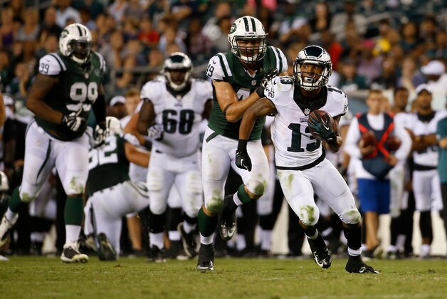 Philadelphia Eagles' Damaris Johnson runs a catch for a touchdown during the second half of an NFL preseason football game against the New York Jets, Thursday, Aug. 28, 2014, in Philadelphia. (AP Photo/Chris Szagola)