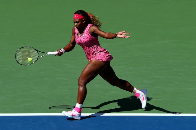 NEW YORK, NY - AUGUST 28:  Serena Williams of the United States returns a shot against Vania King of the United States during their women's singles second round match on Day Four of the 2014 US Open at the USTA Billie Jean King National Tennis Center on August 28, 2014 in the Flushing neighborhood of the Queens borough of New York City.  (Photo by Elsa/Getty Images)