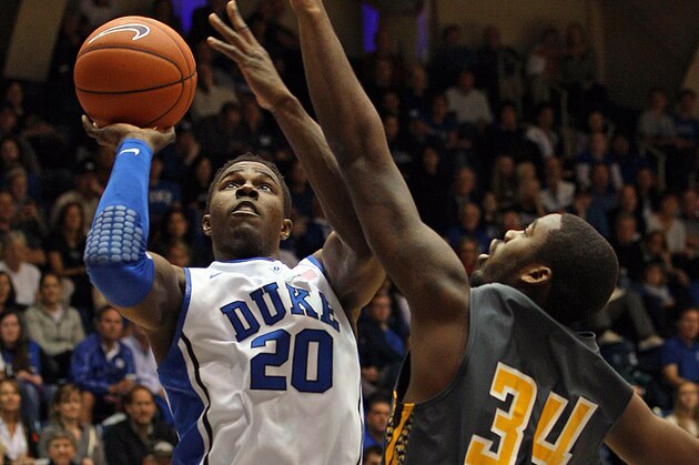 Duke's Semi Ojeleye (20) shoots the ball over Bowie State's Joel Clemmons (34) during the second half of an exhibition NCAA college basketball game in Durham, N.C., Saturday, Oct. 26, 2013. Duke won 103-67.(AP Photo/Karl B DeBlaker)