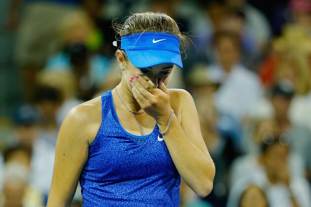NEW YORK, NY - AUGUST 28:  Catherine 'CiCi' Bellis of the United States reacts against Zarina Diyas of Kazakhstan during their women's singles second round match on Day Four of the 2014 US Open at the USTA Billie Jean King National Tennis Center on August 28, 2014 in the Flushing neighborhood of the Queens borough of New York City.  (Photo by Chris Trotman/Getty Images for USTA)