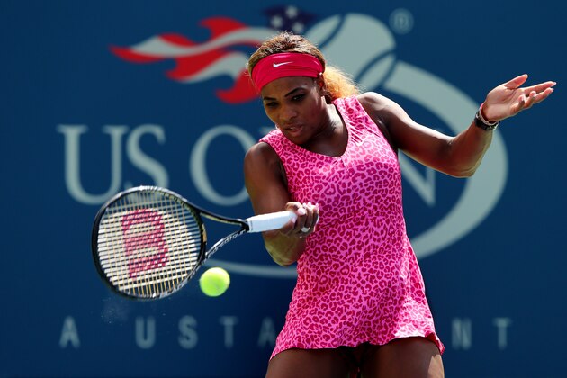 NEW YORK, NY - AUGUST 28:  Serena Williams of the United States returns a shot against Vania King of the United States during their women's singles second round match on Day Four of the 2014 US Open at the USTA Billie Jean King National Tennis Center on August 28, 2014 in the Flushing neighborhood of the Queens borough of New York City.  (Photo by Elsa/Getty Images)