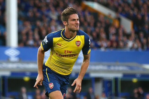 LIVERPOOL, ENGLAND - AUGUST 23:  Olivier Giroud of Arsenal celebrates scoring his team's second goal during the Barclays Premier League match between Everton and Arsenal at Goodison Park on August 23, 2014 in Liverpool, England.  (Photo by Clive Brunskill/Getty Images)