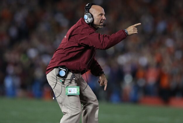 Jan 6, 2014; Pasadena, CA, USA; Florida State Seminoles assistant Charles Kelly reacts on the sidelines during the game against the Auburn Tigers in the 2014 BCS National Championship game at the Rose Bowl. Mandatory Credit: Matthew Emmons-USA TODAY Sports