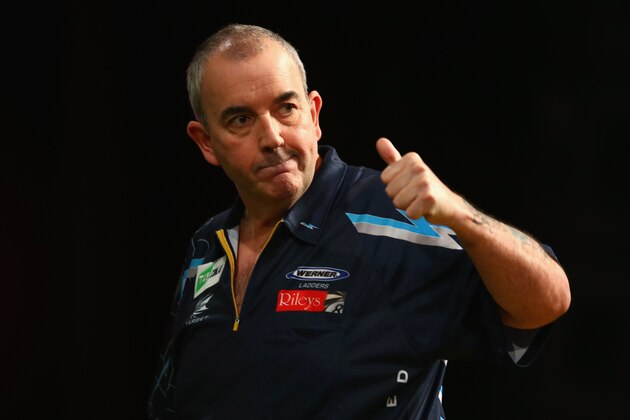 SYDNEY, AUSTRALIA - AUGUST 29:  Phil Taylor of England celebrates during his quarter-final match against Dave Chisnall of England during the Sydney Darts Masters at Hordern Pavilion on August 29, 2014 in Sydney, Australia.  (Photo by Mark Kolbe/Getty Images)