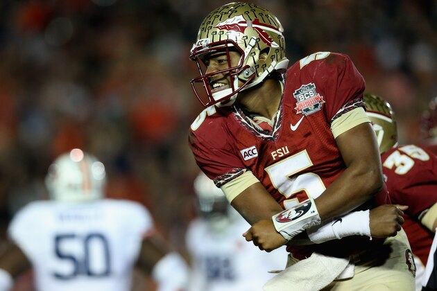PASADENA, CA - JANUARY 06:  Quarterback Jameis Winston #5 of the Florida State Seminoles celebrates after a 2-yard pass for a touchdown to take a 33-31 lead over the Auburn Tigers in the final moments of the fourth quarter during the 2014 Vizio BCS National Championship Game at the Rose Bowl on January 6, 2014 in Pasadena, California. Florida State lead 34-31 after a successful extra point.  (Photo by Stephen Dunn/Getty Images)