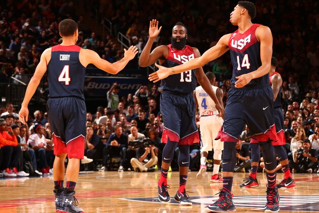 NEW YORK, NY - AUGUST 22:  Teammates Stephen Curry #4, James Harden #13, and Anthony Davis #14 of the USA Basketball Men's National Team high-five during a game against the Puerto Rico Basketball Men's National Team on August 22, 2014 at Madison Square Garden in New York, New York.  NOTE TO USER: User expressly acknowledges and agrees that, by downloading and/or using this Photograph, user is consenting to the terms and conditions of the Getty Images License Agreement. Mandatory Copyright Notice: Copyright 2014 NBAE (Photo by Nathaniel S. Butler/NBAE via Getty Images)