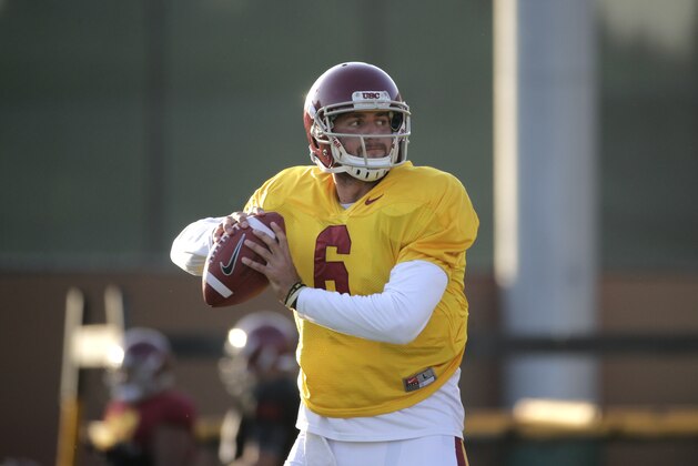 Southern California quarterback Cody Kessler throws a pass during NCAA college football practice Wednesday, Aug. 20, 2014, in Los Angeles. (AP Photo/Jae C. Hong)