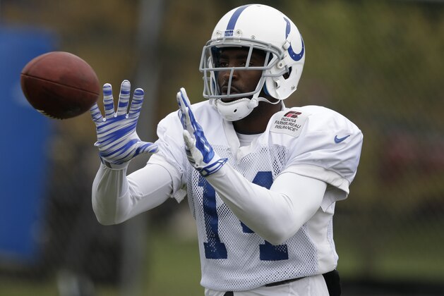 Indianapolis Colts wide receiver Hakeem Nicks makes a catch during NFL football training camp Tuesday, Aug. 12, 2014, in Anderson, Ind. (AP Photo/Darron Cummings)