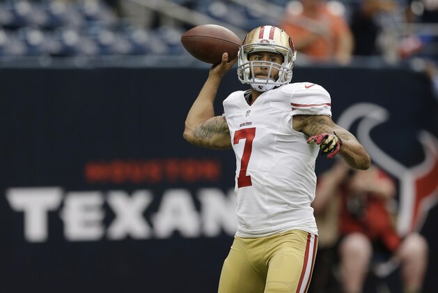 San Francisco 49ers' Colin Kaepernick throws before an NFL football preseason game against the Houston Texans, Thursday, Aug. 28, 2014, in Houston. (AP Photo/David J. Phillip)