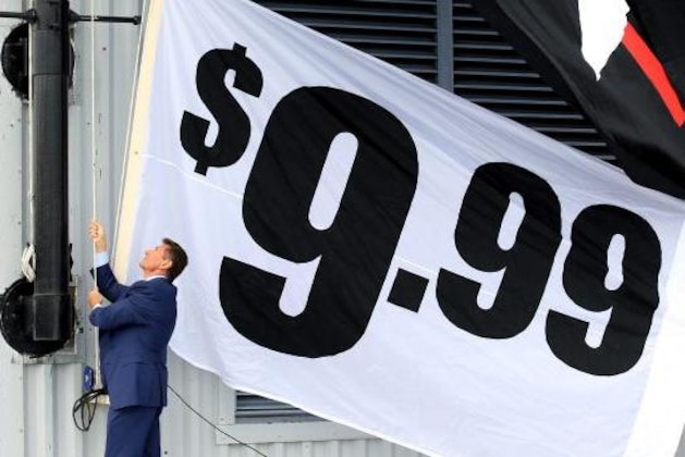 WWE Chairman Vince McMahon unveils WWE's new corporate logo at WWE Headquarters in Stamford, Connecticut.
