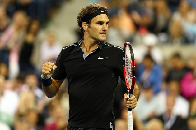 NEW YORK, NY - AUGUST 26:  Roger Federer of Switzerland reacts against Marinko Matosevic of Australia during their men's singles first round match on Day Two of the 2014 US Open at the USTA Billie Jean King National Tennis Center on August 26, 2014  in the Flushing neighborhood of the Queens borough of New York City.  (Photo by Elsa/Getty Images)