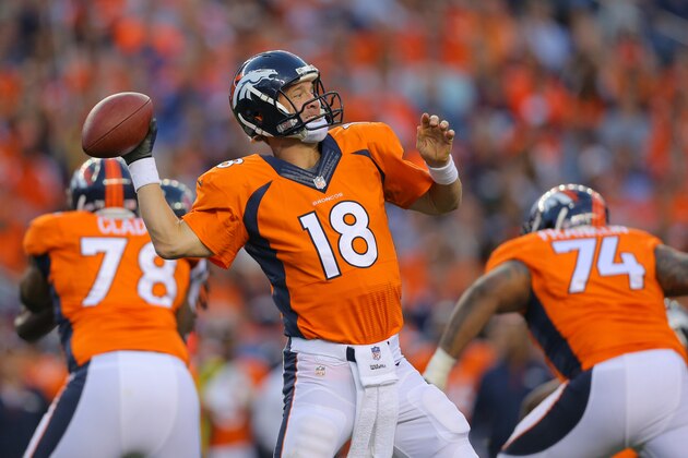 DENVER, CO - AUGUST 23:  Quarterback Peyton Manning #18 of the Denver Broncos throws against the Houston Texans during a preseason game at Sports Authority Field at Mile High on August 23, 2014 in Denver, Colorado.  (Photo by Justin Edmonds/Getty Images)
