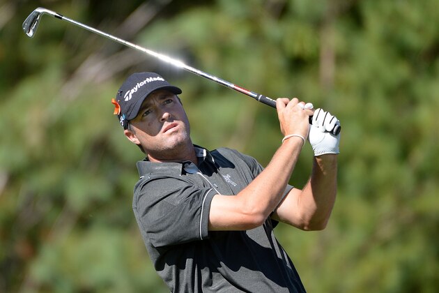 NORTON, MA - AUGUST 29:  Ryan Palmer takes his shot on the third hole during the first round of the Deutsche Bank Championship  at the TPC Boston on August 29, 2014 in Norton, Massachusetts.  (Photo by Ross Kinnaird/Getty Images)
