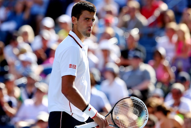 NEW YORK, NY - AUGUST 28:  Novak Djokovic of Serbia reacts after defeating Paul-Henri Mathieu of France during their men's second round match on Day Four of the 2014 US Open at the USTA Billie Jean King National Tennis Center on August 28, 2014 in the Flushing neighborhood of the Queens borough of New York City.  (Photo by Elsa/Getty Images)