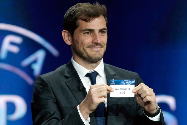 Real Madrid golkepper Iker Casillas shows the name of Real Madrid, who will play in Group B,  during the UEFA Champions League draw at the Grimaldi Forum, in Monaco, Thursday, Aug. 28, 2014. (AP Photo/Claude Paris)