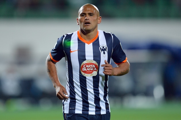 AGADIR, MOROCCO - DECEMBER 14:  Humberto Suazo of Monterrey is pointed with a laser during the FIFA Club World Cup Quarterfinal match between Raja Casablanca and CF Monterrey at Agadir Stadium on December 14, 2013 in Agadir, Morocco.  (Photo by Lars Baron/Getty Images)