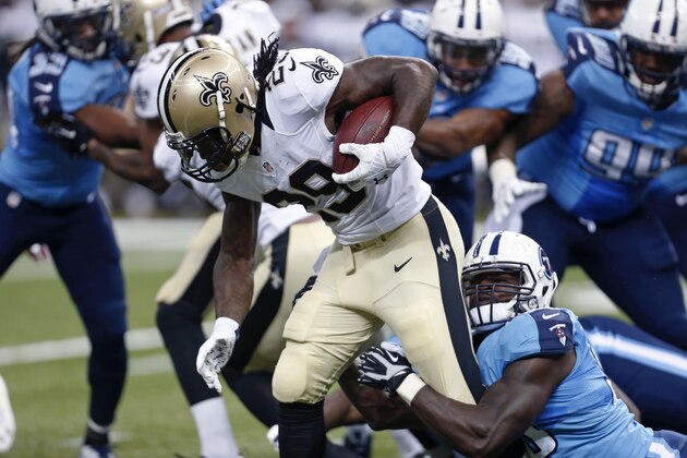 New Orleans Saints running back Khiry Robinson (29) carries in the first half of an NFL preseason football game against the Tennessee Titans in New Orleans, Friday, Aug. 15, 2014. (AP Photo/Rogelio Solis)