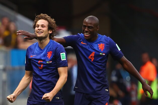 BRASILIA, BRAZIL - JULY 12: Daley Blind of the Netherlands (L) celebrates scoring his team's second goal with teammate Bruno Martins Indi during the 2014 FIFA World Cup Brazil Third Place Playoff match between Brazil and the Netherlands at Estadio Nacional on July 12, 2014 in Brasilia, Brazil. (Photo by Robert Cianflone/Getty Images) BRASILIA, BRAZIL - JULY 12: Daley Blind of the Netherlands (L) celebrates scoring his team's second goal with teammate Bruno Martins Indi during the 2014 FIFA World Cup Brazil Third Place Playoff match between Brazil and the Netherlands at Estadio Nacional on July 12, 2014 in Brasilia, Brazil. (Photo by Robert Cianflone/Getty Images)