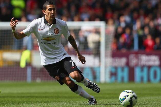 BURNLEY, ENGLAND - AUGUST 30:  Angel di Maria of Manchester United runs with the ball during the Barclays Premier League match between Burnley and Manchester United at Turf Moor on August 30, 2014 in Burnley, England.  (Photo by Clive Brunskill/Getty Images)