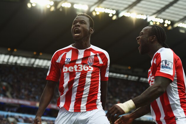 MANCHESTER, ENGLAND - AUGUST 30:  Mame Biram Diouf (L) of Stoke City celebrates scoring the opening goal during the Barclays Premier League match between Manchester City and Stoke City at Etihad Stadium on August 30, 2014 in Manchester, England.  (Photo by Shaun Botterill/Getty Images)