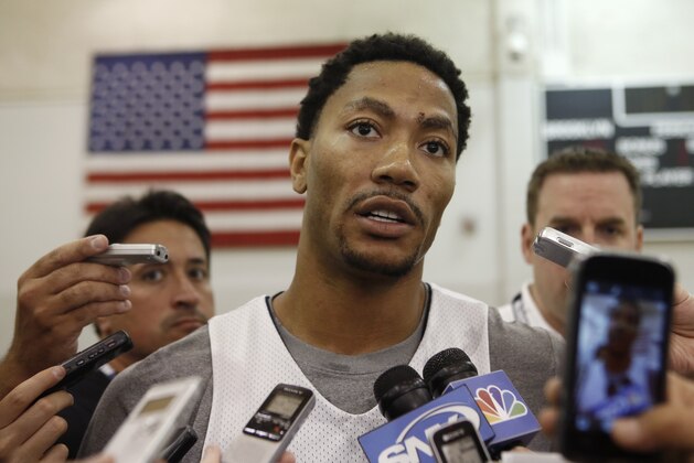 USA Basketball guard Derrick Rose of the Chicago Bulls speaks to the press after a team practice at the Brooklyn Nets training facility in East Rutherford, N.J., Tuesday, Aug. 19, 2014. Team USA faces the Dominican Republic at Madison Square Garden Wednesday night in advance of the FIBA World Cup Basketball tournament Aug. 30 through Sept. 14 in Spain. (AP Photo/Kathy Willens)