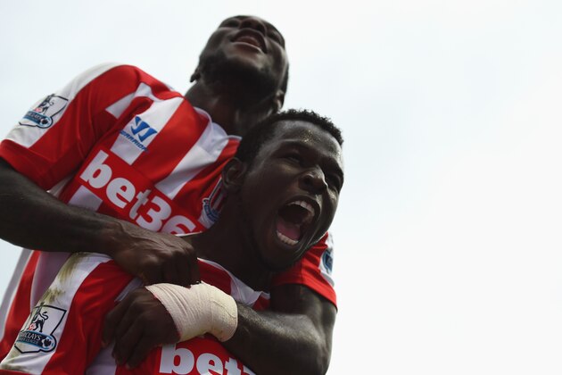 MANCHESTER, ENGLAND - AUGUST 30:  Mame Biram Diouf (R) of Stoke City celebrates scoring the opening goal during the Barclays Premier League match between Manchester City and Stoke City at Etihad Stadium on August 30, 2014 in Manchester, England.  (Photo by Shaun Botterill/Getty Images)