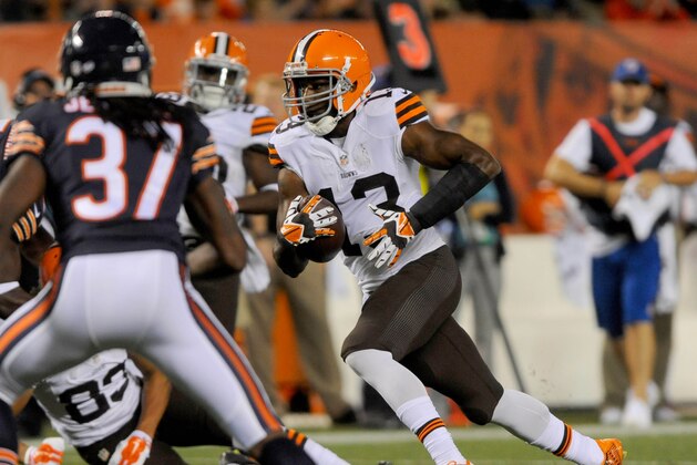 Aug 28, 2014; Cleveland, OH, USA; Cleveland Browns wide receiver Nate Burleson (13) runs with the ball after a catch during the second quarter at FirstEnergy Stadium. Mandatory Credit: Ken Blaze-USA TODAY Sports