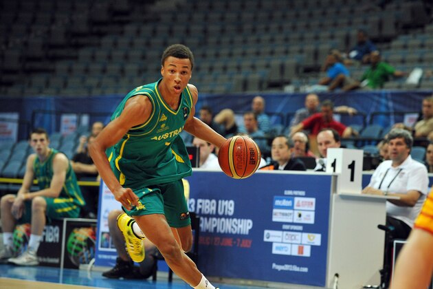 This June 29, 2013 photo provided by FIBA shows Australian basketball player Dante Exum during the FIBA U19 championship match against Brazil in Prague. Exum is a possible pick in the 2014 NBA Draft, Thursday, June 26, 2014 in New York.(AP Photo/FIBA)