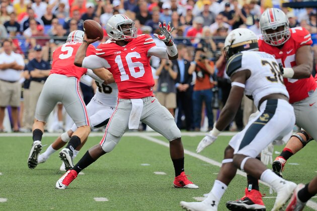 BALTIMORE, MD - AUGUST 30:  Quarterback J.T. Barrett #16 of the Ohio State Buckeyes throws a third quarter touchdown pass against the Navy Midshipmen during the first half at M&T Bank Stadium on August 30, 2014 in Baltimore, Maryland.  (Photo by Rob Carr/Getty Images)