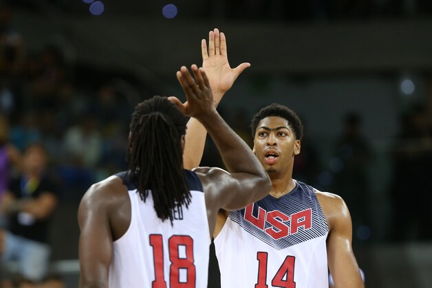 LAS PALMAS, GRAN CANARIA, SPAIN - AUGUST 26:Kenneth Faried #18 and Anthony Davis #14 of the USA Men's National Team celebrates against the Slovenia National Team on August 26, 2014 at Gran Canaria Arena in Las Palmas, Gran Canaria, Spain. NOTE TO USER: User expressly acknowledges and agrees that, by downloading and or using this photograph, user is consenting to the terms and conditions of the Getty Images License Agreement. Mandatory Copyright Notice: Copyright 2014 NBAE (Photo by Joe Murphy/NBAE via Getty Images)