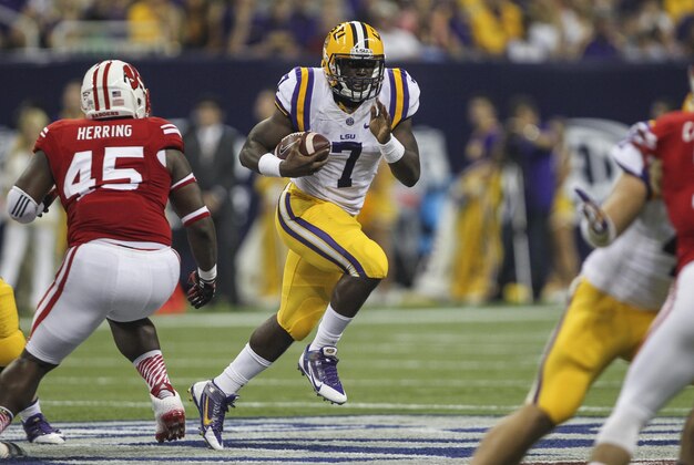 Aug 30, 2014; Houston, TX, USA; LSU Tigers running back Leonard Fournette (7) rushes with the ball during the first quarter against the Wisconsin Badgers at NRG Stadium. Mandatory Credit: Troy Taormina-USA TODAY Sports