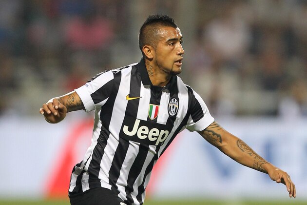 REGGIO NELL'EMILIA, ITALY - AUGUST 23:  Arturo Vidal of FC Juventus in action during the TIM Pre-season Tournament between US Sassuolo, FC Juventus and AC Milan at Mapei Stadium - Citta' del Tricolore on August 23, 2014 in Reggio nell'Emilia, Italy.  (Photo by Paolo Bruno/Getty Images)