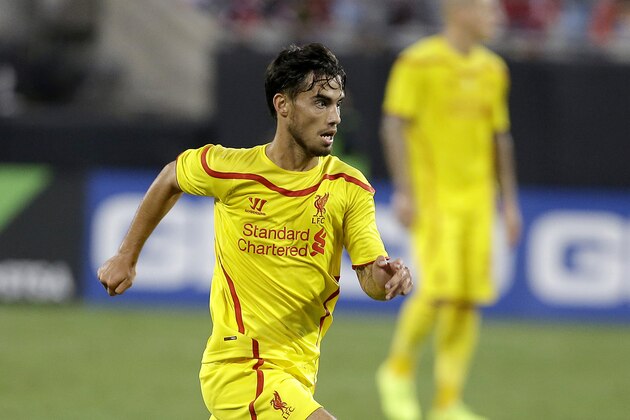 Liverpool's Suso advances the ball against AC Milan during a Guinness International Champions Cup soccer match in Charlotte, N.C., Saturday, Aug. 2, 2014. Liverpool won 2-0. (AP Photo/Bob Leverone)