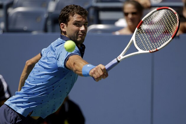 Grigor Dimitrov, of Bulgaria, returns a shot against Dudi Sela, of Israel, during the second round of the 2014 U.S. Open tennis tournament, Friday, Aug. 29, 2014, in New York. (AP Photo/Frank Franklin II)