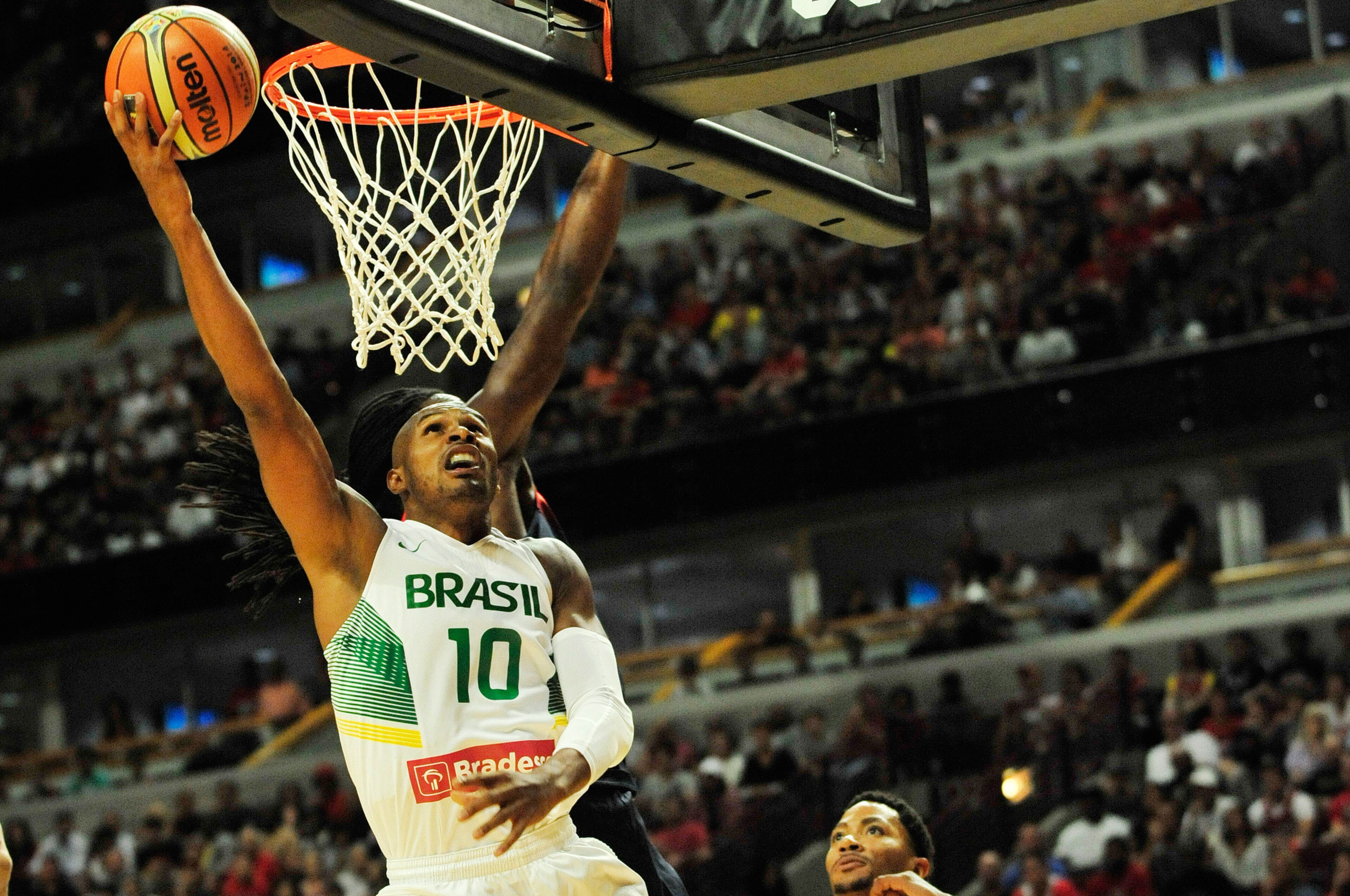 Aug 16, 2014; Chicago, IL, USA; Brazil guard Leandro Barbosa (10) is defended by United States guard Derrick Rose (6) during the first quarter at the United Center. Mandatory Credit: David Banks-USA TODAY Sports