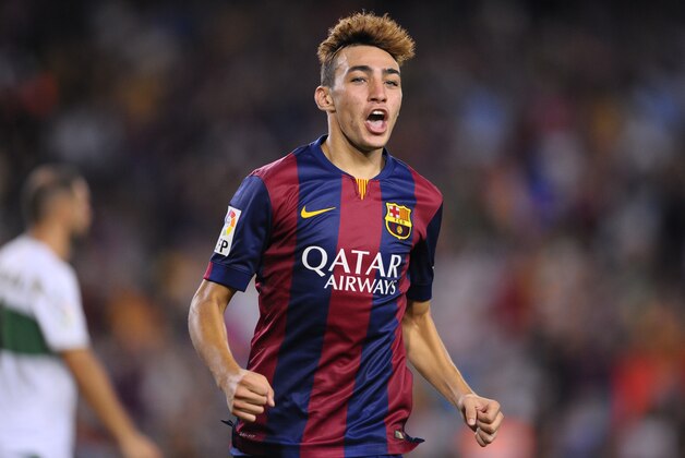 FC Barcelona's Munir reacts after scoring against Elche during a Spanish La Liga soccer match at the Camp Nou stadium in Barcelona, Spain, Sunday, Aug. 24, 2014. (AP Photo/Manu Fernandez)
