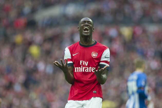 Arsenal's Yaya Sanogo, reacts, during their English FA Cup semifinal soccer match against  Wigan Athletic, at the Wembley Stadium in London, Saturday, April 12, 2014. (AP Photo/Bogdan Maran)