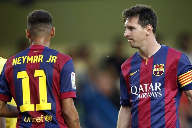 Barcelona's Lionel Messi, from Argentina, and Neymar, from Brazil, during a Spanish La Liga soccer match against Villarreal at the Madrigal stadium in Villarreal, Spain, on Sunday, Aug 31, 2014.(AP Photo/Alberto Saiz)