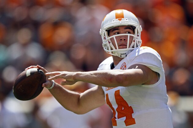 FILE - In this April 12, 2014, file photo, Tennessee quarterback Justin Worley throws to a receiver during the annual Orange and White NCAA college spring football game in Knoxville, Tenn. Worley is battling teammates Joshua Dobbs and Nathan Peterman to be the starting quarterback. (AP Photo/Wade Payne, File)