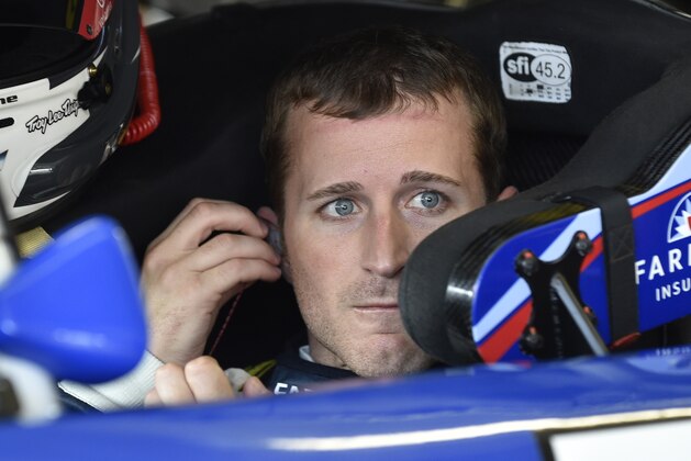 NASCAR driver Kasey Kahne gets ready to practice for Sunday's NASCAR auto race at Atlanta Motor Speedway in Hampton, Ga., Friday, August 29, 2014. (AP Photo/David Tulis)